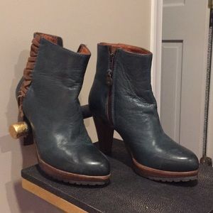 New boot with soft teal and brown accents